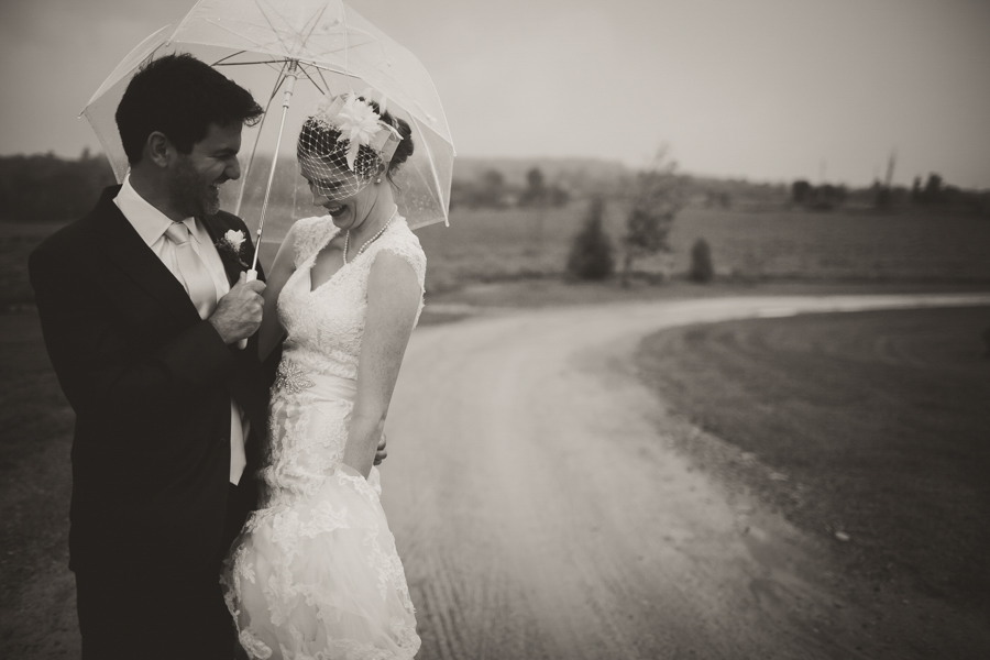 rainy wedding bride and groom