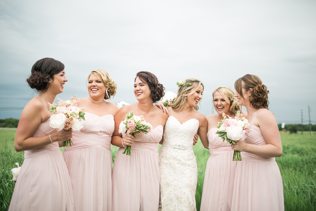 bridesmaids portrait pink dresses