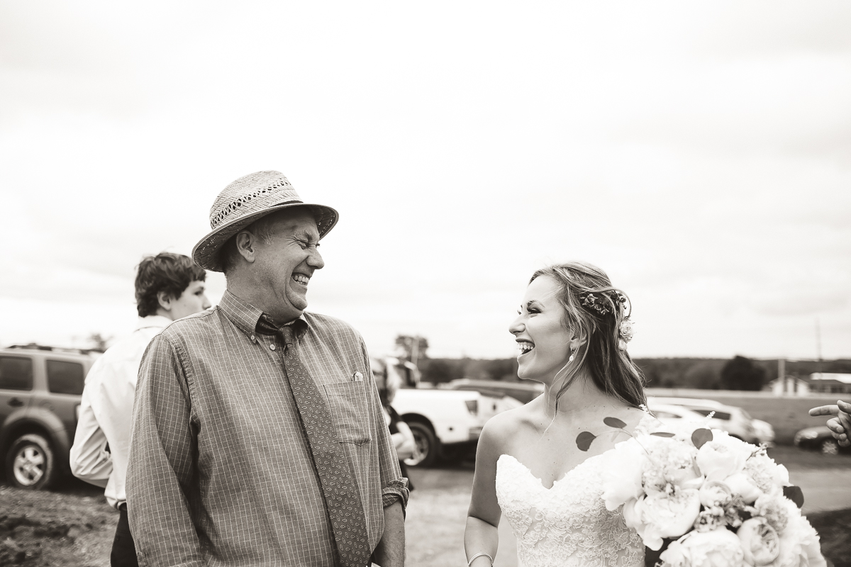 bride groom laughing