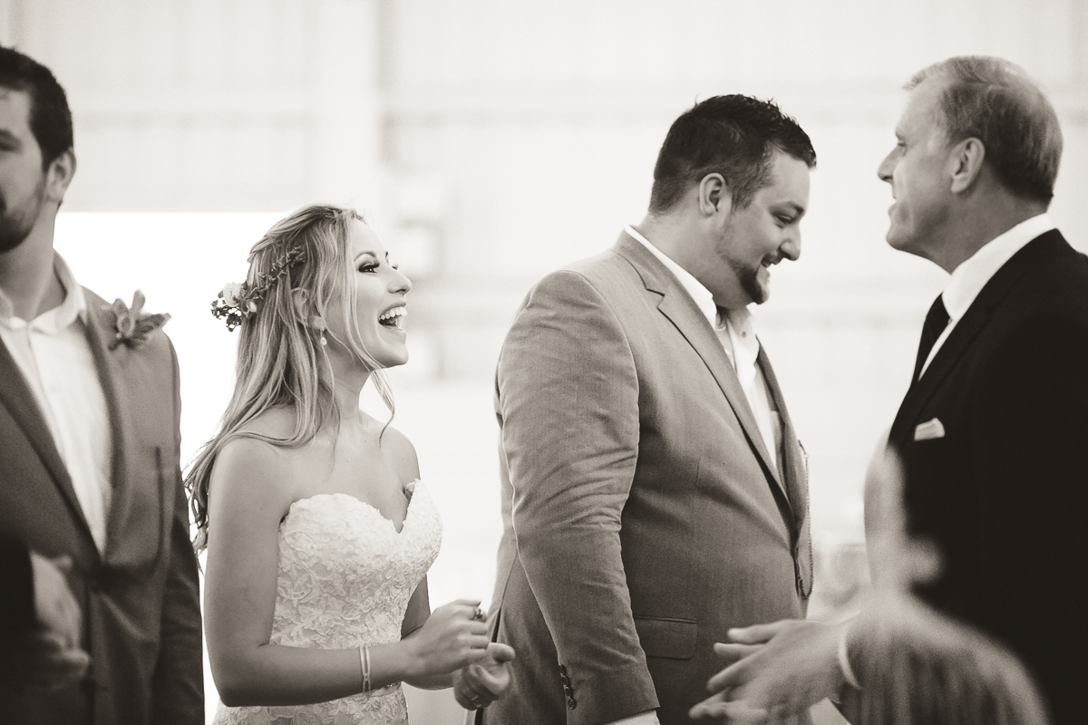 bride groom laughing