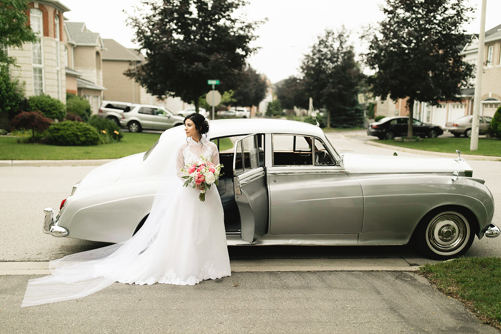 Bride getting into classic car wedding toronto