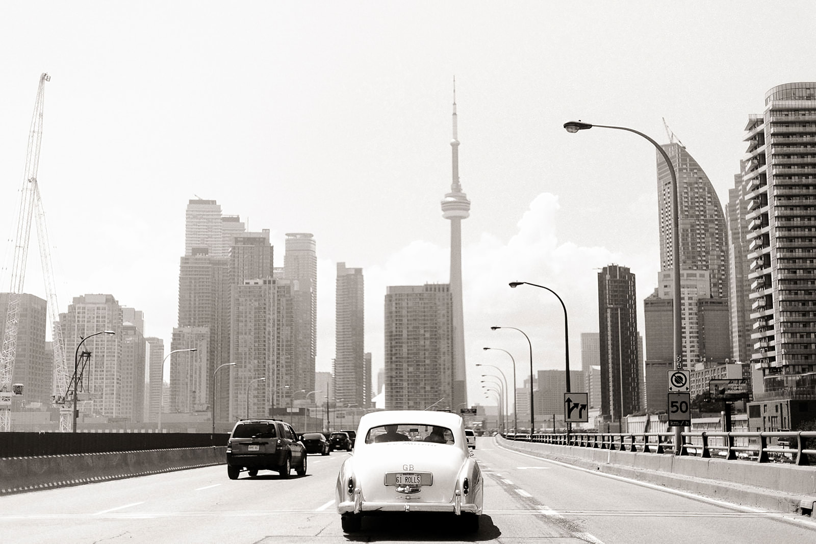 Wedding car driving downtown toronto