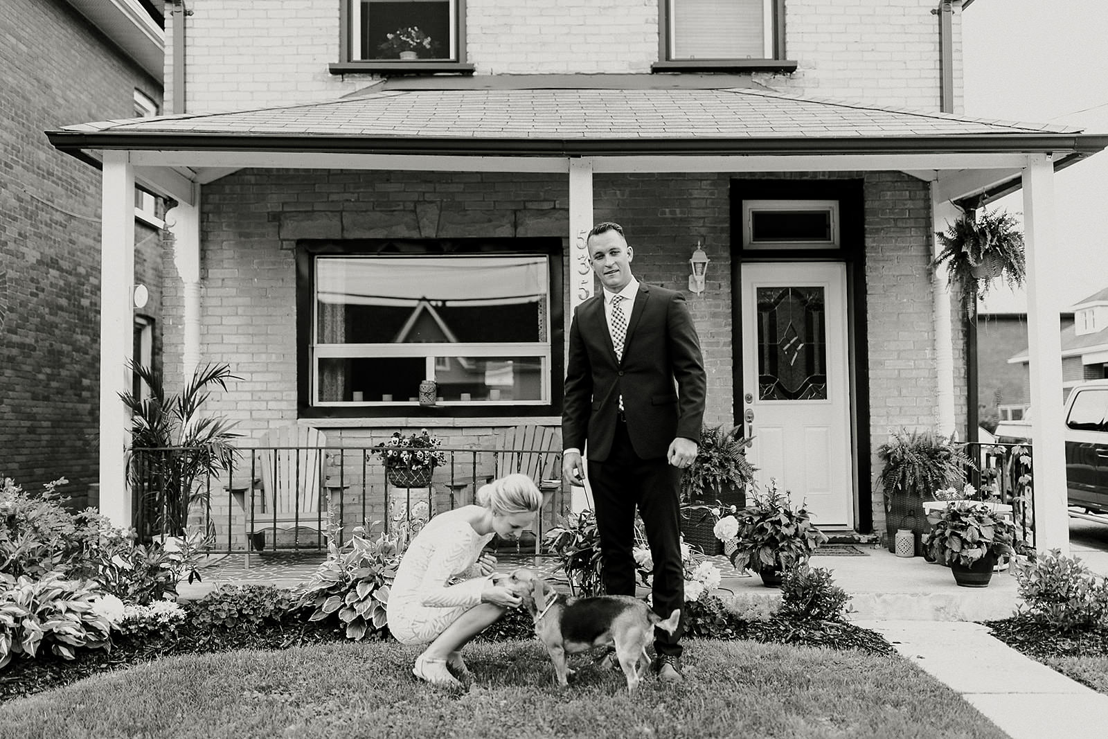 intimate city hall wedding bride and groom portraits with dog