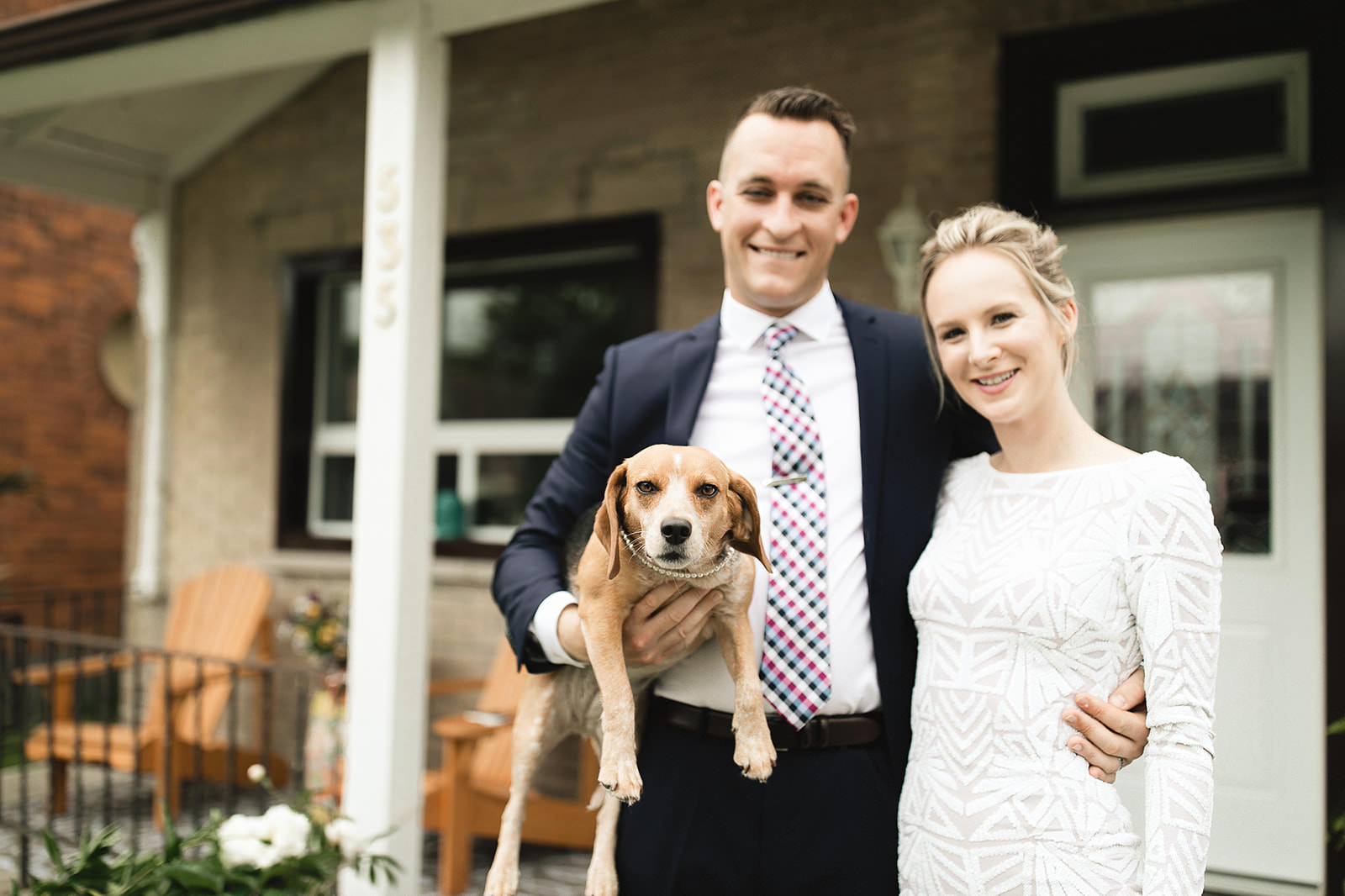 intimate city hall wedding bride and groom portraits with dog