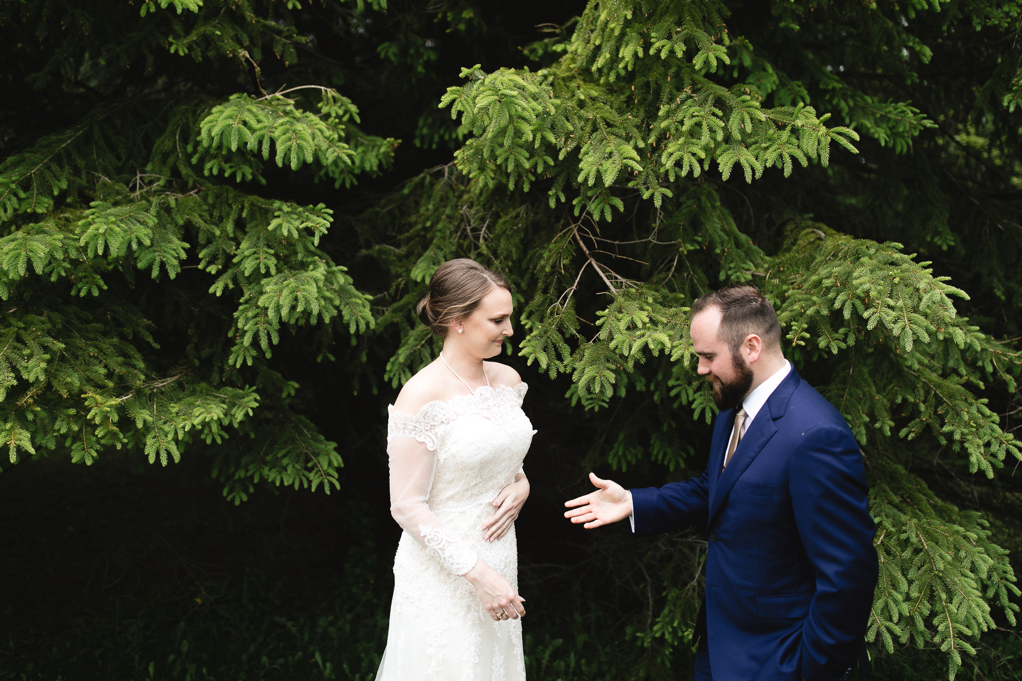 forest first look bride and groom